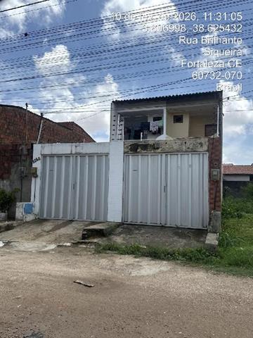 Casa com 2 quartos, 3 banheiros e 2 vagas de garagem