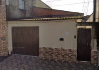 Casa térrea com edícula em Guarujá - Oportunidade imperdível!