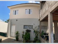 Casa com 4 quartos, 2 banheiros e 425,68 m² de área construída