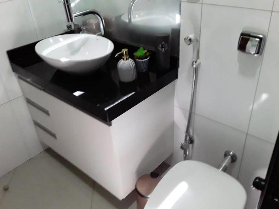 Casa com 3 quartos, 2 banheiros e 164m² construída, ocupada