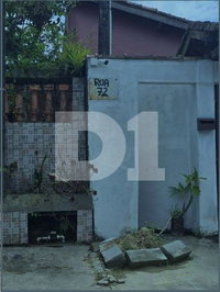Casa com 100m² de área construída e 2 vagas, ocupada por inquilinos