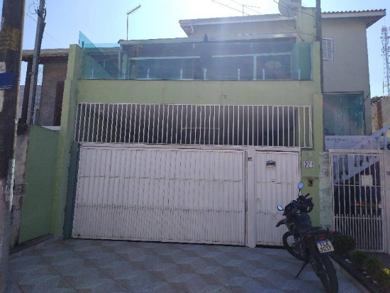 Casa com 1 vaga de garagem, 152,09 m² de terreno, 196,62 m² construída, ocupada