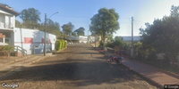 Terreno urbano 439m² com casa estilo cabana 116m² em estado ruim