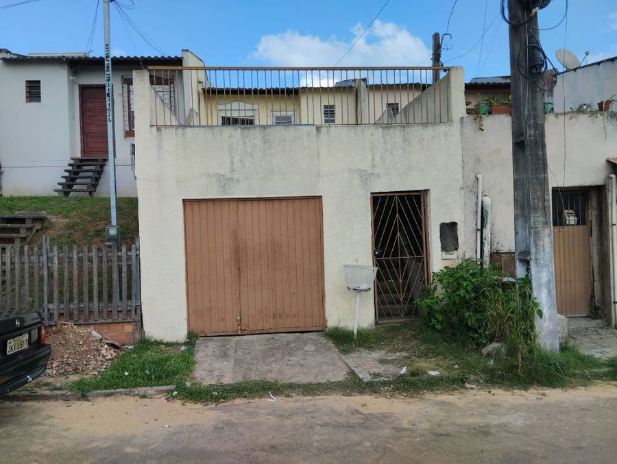 Casa ocupada com 69m² construída, ideal para investimento
