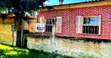 Casa Ocupada com 1 Vaga em Leilão