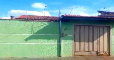 Casa com 3 quartos, 2 banheiros e 150m² construída, ocupada