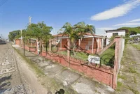 Terreno urbano com casa em Arroio do Sal, 181,10 m² construídos