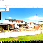 Casa Alvenaria com 2 Terrenos em Atlântida Sul - 600m²