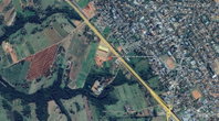 Terreno com benfeitorias e construção abandonada, 53.846m²