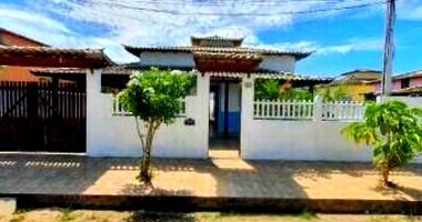 Casa aconchegante com 2 quartos, 2 banheiros e 84m² construída, ocupada