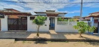 Casa aconchegante com 2 quartos, 2 banheiros e 84m² construída, ocupada