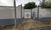 Casa com 3 quartos, 2 banheiros, 409.63 m² construída, ocupada