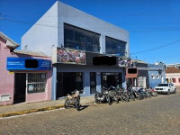 Terreno com Prédio Comercial - Fração de 50%