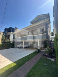 Casa em Condomínio com 4 quartos, 8 vagas e 437,12 m²