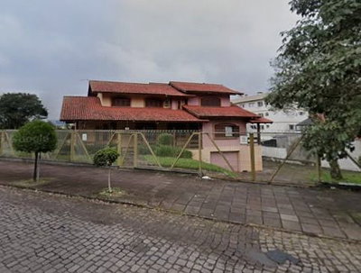 Terreno Urbano com Prédio Residencial de 525,95m² em Caxias do Sul/RS