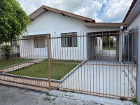 Terreno urbano com casa de madeira em Conselheiro Mairinck - PR