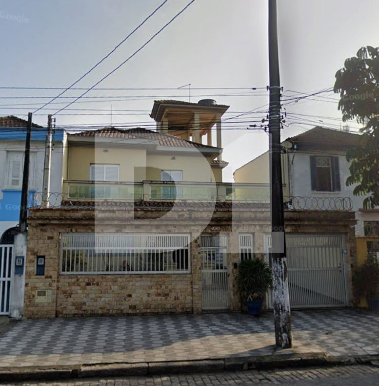 Casa com 4 quartos, 3 suítes, 2 vagas, 374,85 m² construída, ocupada