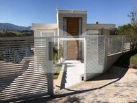 Casa em Condomínio com 5 Suítes e Amplo Jardim em Joanópolis/SP