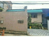 Casa ocupada com 96 m² de área construída