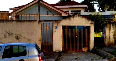 Casa com 2 quartos, 2 banheiros, garagem e 160m² construída, ocupada