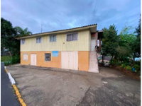 Casa Ocupada no Loteamento Pérola com Ampla Área