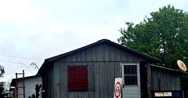 Lote Urbano com Casa de Moradia em Roque Gonzales/RS