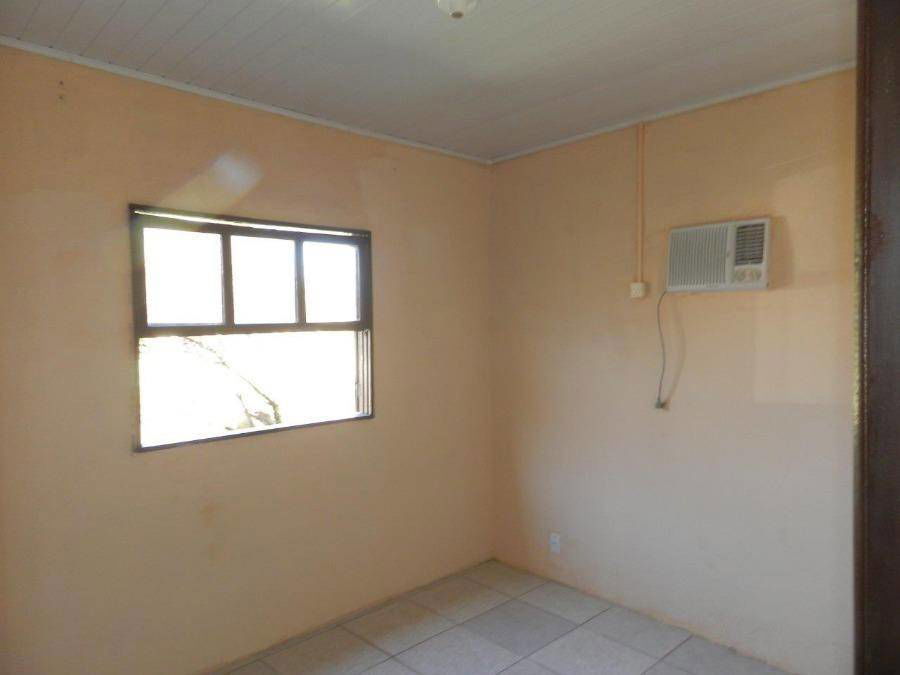 Casa com 3 quartos, 2 banheiros, 102m² construída, ocupada