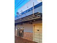 Terreno com sobrado e área gourmet com piscina