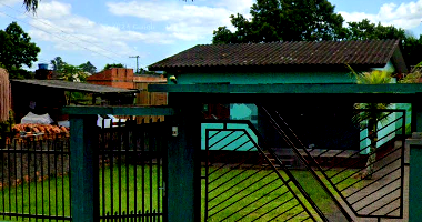 Direitos sobre Terreno com 702,19m² e Edificações