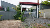 Casa com 2 construções em terreno de 360m²