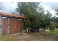 Casa com ótimo terreno em condomínio na Ilha