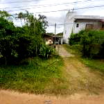 Terreno de 360m² com benfeitorias no Bairro Itapuã