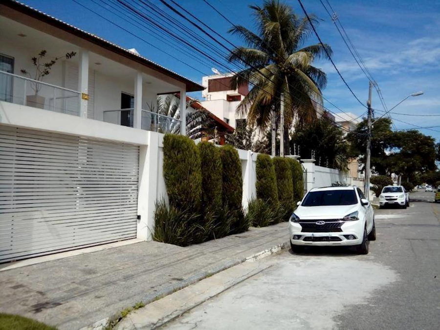 Casa espaçosa com 4 quartos, 6 banheiros e 418.9 m² construída, ocupada