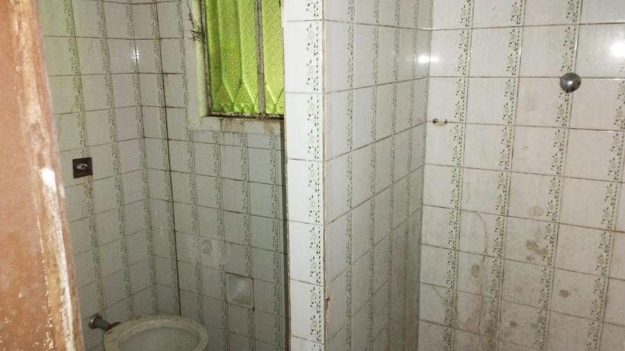 Casa com 3 quartos, 2 banheiros e 150m² construída, ocupada