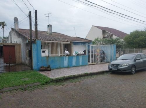 Lote urbano 336m² com casa 148m² em Porto Alegre/RS