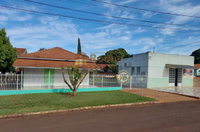 Lote Urbano com Construções Residenciais e Comerciais