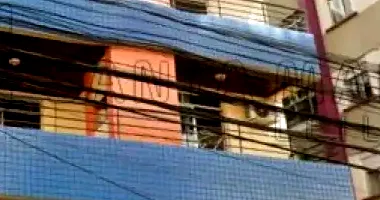 Apartamento com Box em Edifício Central