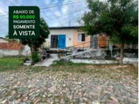 Casa ocupada com 77 m² construídos em terreno de 126 m²