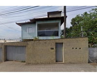 Casa com 2 suítes e lote de 490,70m² em Itaúna/MG
