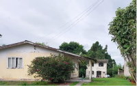 Terreno urbano com casa e edícula em Paranaguá
