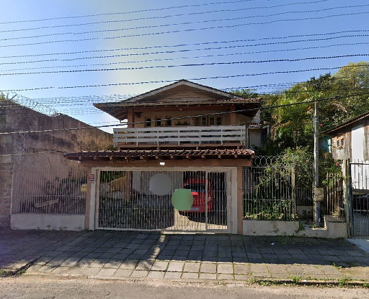 Casa com 3 quartos, 2 banheiros, 281m² construída, ocupada