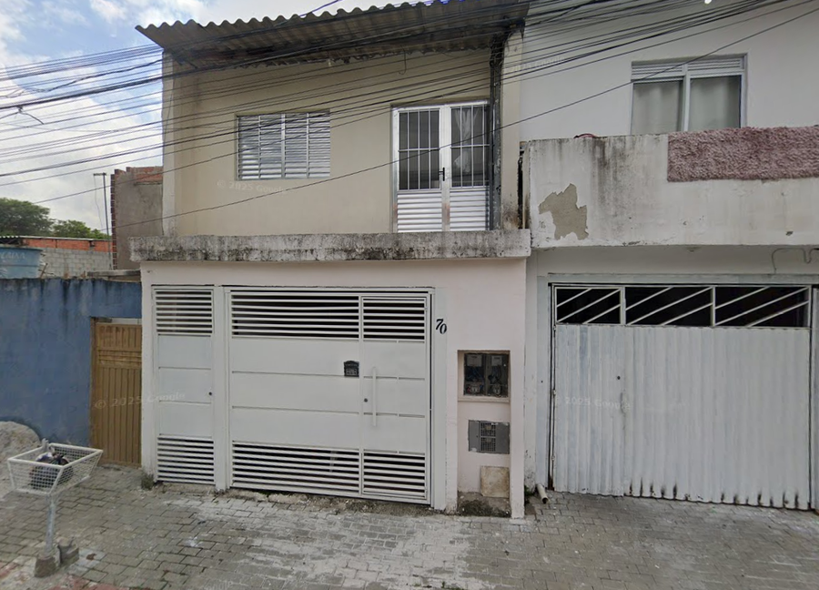Terreno com área construída em Poá