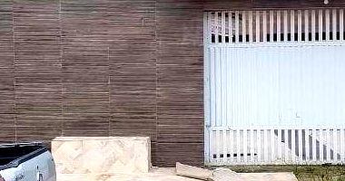 Casa com 3 quartos, 2 banheiros e 2 vagas, área construída 170m², ocupada