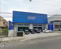 Terreno comercial 1.168m² com sala e obras inacabadas no Centro de Araranguá