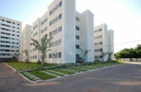 Apartamento com 2 quartos, 1 suíte, sala, cozinha americana e área de garden privativa