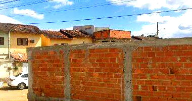 Prédio com área privativa de 65,2m² e terreno de 122,72m²