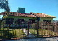 Casa de alvenaria com 291,54m², 2 pavimentos e edícula
