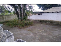Terreno com 373,10m² e residência de 80m² em Matinhos
