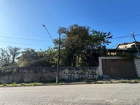 Casa com 4 quartos e 2 banheiros, área construída de 141,42 m², ocupada