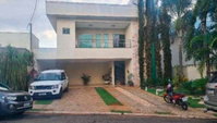 Casa espaçosa em condomínio com 5 quartos, 5 banheiros e 457 m² construída, ocupada